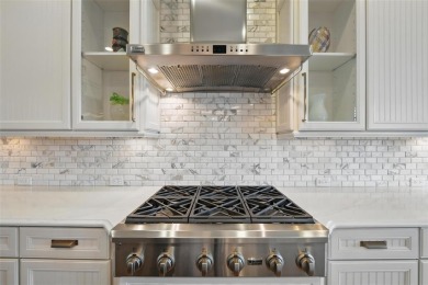 Situated directly on the 5th green, this luxury residence offers on Wildhorse Golf Club of Robson Ranch in Texas - for sale on GolfHomes.com, golf home, golf lot