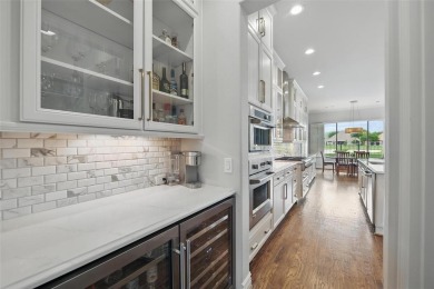 Situated directly on the 5th green, this luxury residence offers on Wildhorse Golf Club of Robson Ranch in Texas - for sale on GolfHomes.com, golf home, golf lot