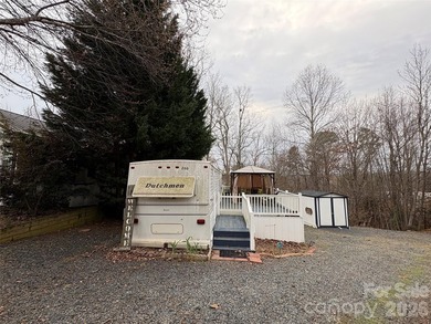 Welcome to lake living made easy in the highly sought-after on Old North State Club at Uwharrie Point Golf community in North Carolina - for sale on GolfHomes.com, golf home, golf lot