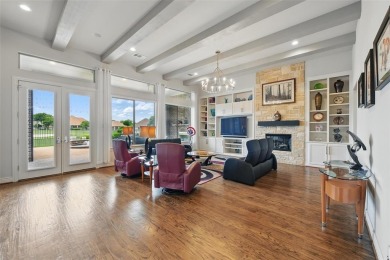 Situated directly on the 5th green, this luxury residence offers on Wildhorse Golf Club of Robson Ranch in Texas - for sale on GolfHomes.com, golf home, golf lot