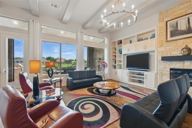 Situated directly on the 5th green, this luxury residence offers on Wildhorse Golf Club of Robson Ranch in Texas - for sale on GolfHomes.com, golf home, golf lot