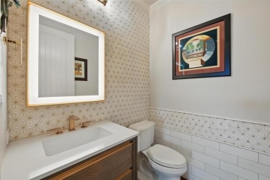 Situated directly on the 5th green, this luxury residence offers on Wildhorse Golf Club of Robson Ranch in Texas - for sale on GolfHomes.com, golf home, golf lot