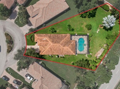 Located on one of the largest lots in The Lakes at PGA Village on PGA Golf Club in PGA Village in Florida - for sale on GolfHomes.com, golf home, golf lot