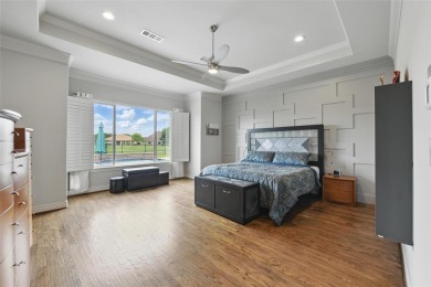 Situated directly on the 5th green, this luxury residence offers on Wildhorse Golf Club of Robson Ranch in Texas - for sale on GolfHomes.com, golf home, golf lot