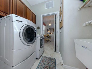 Stunning, Ghiberti WCI-built model villa offers a on Venetian Golf and River Club in Florida - for sale on GolfHomes.com, golf home, golf lot