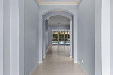 Located on one of the largest lots in The Lakes at PGA Village on PGA Golf Club in PGA Village in Florida - for sale on GolfHomes.com, golf home, golf lot