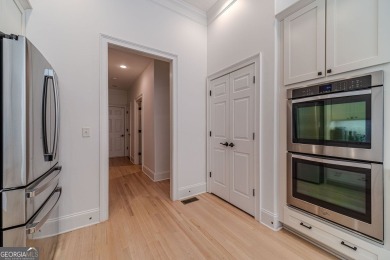 Beautiful details throughout in this impeccably maintained on Hamilton Mill Golf Club in Georgia - for sale on GolfHomes.com, golf home, golf lot