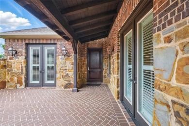 Situated directly on the 5th green, this luxury residence offers on Wildhorse Golf Club of Robson Ranch in Texas - for sale on GolfHomes.com, golf home, golf lot