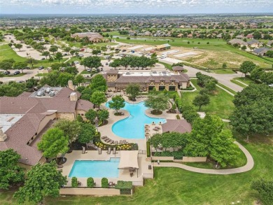 Situated directly on the 5th green, this luxury residence offers on Wildhorse Golf Club of Robson Ranch in Texas - for sale on GolfHomes.com, golf home, golf lot