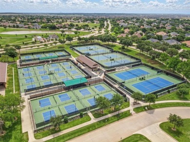 Situated directly on the 5th green, this luxury residence offers on Wildhorse Golf Club of Robson Ranch in Texas - for sale on GolfHomes.com, golf home, golf lot