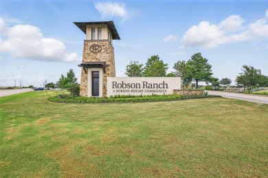 Situated directly on the 5th green, this luxury residence offers on Wildhorse Golf Club of Robson Ranch in Texas - for sale on GolfHomes.com, golf home, golf lot