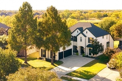 This is more than an upgraded home--it's a masterpiece of modern on The Trails of Frisco Golf Club in Texas - for sale on GolfHomes.com, golf home, golf lot