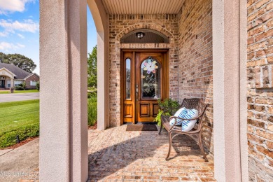 STUNNING HOME IN GLEN EAGLE ON A CORNER LOT OF CUL-DE-SAC on Diamondhead Country Club in Mississippi - for sale on GolfHomes.com, golf home, golf lot