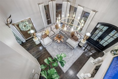 This is more than an upgraded home--it's a masterpiece of modern on The Trails of Frisco Golf Club in Texas - for sale on GolfHomes.com, golf home, golf lot