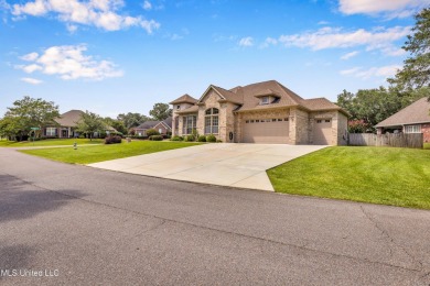 STUNNING HOME IN GLEN EAGLE ON A CORNER LOT OF CUL-DE-SAC on Diamondhead Country Club in Mississippi - for sale on GolfHomes.com, golf home, golf lot