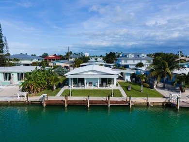 This waterfront half duplex is now available to purchase, or on Key Colony Beach Golf Course in Florida - for sale on GolfHomes.com, golf home, golf lot