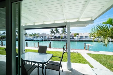 This waterfront half duplex is now available to purchase, or on Key Colony Beach Golf Course in Florida - for sale on GolfHomes.com, golf home, golf lot