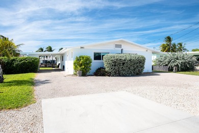 This waterfront half duplex is now available to purchase, or on Key Colony Beach Golf Course in Florida - for sale on GolfHomes.com, golf home, golf lot