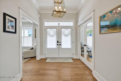 Welcome to 5083 Creswell Drive, a true gem located in the highly on Cape Fear National At Brunswick Forest in North Carolina - for sale on GolfHomes.com, golf home, golf lot