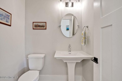 Welcome to 5083 Creswell Drive, a true gem located in the highly on Cape Fear National At Brunswick Forest in North Carolina - for sale on GolfHomes.com, golf home, golf lot