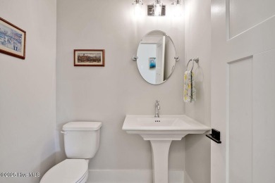 Welcome to 5083 Creswell Drive, a true gem located in the highly on Cape Fear National At Brunswick Forest in North Carolina - for sale on GolfHomes.com, golf home, golf lot