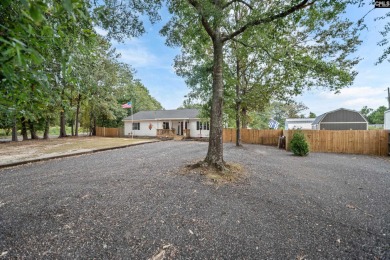 Welcome to your dream home! Nestled on a picturesque corner lot on Timberlake Country Club in South Carolina - for sale on GolfHomes.com, golf home, golf lot