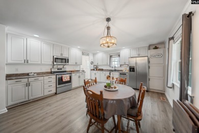 Welcome to your dream home! Nestled on a picturesque corner lot on Timberlake Country Club in South Carolina - for sale on GolfHomes.com, golf home, golf lot