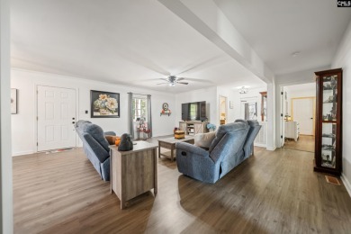 Welcome to your dream home! Nestled on a picturesque corner lot on Timberlake Country Club in South Carolina - for sale on GolfHomes.com, golf home, golf lot