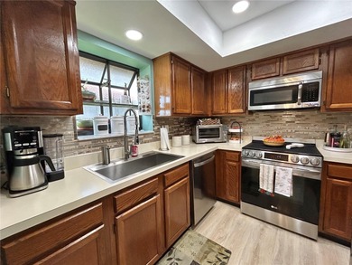 This condo is move-in ready and PRICED TO SELL! Welcome to on Countryside Country Club in Florida - for sale on GolfHomes.com, golf home, golf lot