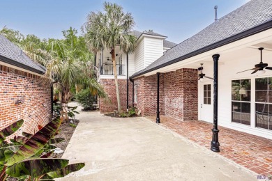 Welcome to this stunning two-story, 5-bedroom, 4.5-bath home on University Club in Louisiana - for sale on GolfHomes.com, golf home, golf lot