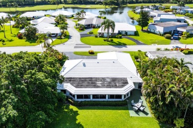RARE 4-BEDROOM SINGLE FAMILY HOME WITH SWEEPING FAIRWAY on Atlantis Golf Club in Florida - for sale on GolfHomes.com, golf home, golf lot
