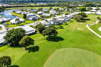 RARE 4-BEDROOM SINGLE FAMILY HOME WITH SWEEPING FAIRWAY on Atlantis Golf Club in Florida - for sale on GolfHomes.com, golf home, golf lot