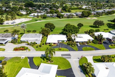 RARE 4-BEDROOM SINGLE FAMILY HOME WITH SWEEPING FAIRWAY on Atlantis Golf Club in Florida - for sale on GolfHomes.com, golf home, golf lot