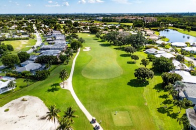 RARE 4-BEDROOM SINGLE FAMILY HOME WITH SWEEPING FAIRWAY on Atlantis Golf Club in Florida - for sale on GolfHomes.com, golf home, golf lot
