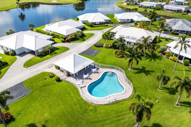 RARE 4-BEDROOM SINGLE FAMILY HOME WITH SWEEPING FAIRWAY on Atlantis Golf Club in Florida - for sale on GolfHomes.com, golf home, golf lot