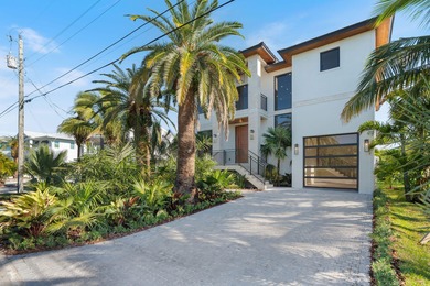 Brand new 2025 waterfront masterpiece. 5 bed, 4 bath, 3,580 sf on Key Colony Beach Golf Course in Florida - for sale on GolfHomes.com, golf home, golf lot