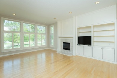 Enjoy luxury living in this stunning executive 1.5-story on Glen Oaks Country Club in Iowa - for sale on GolfHomes.com, golf home, golf lot
