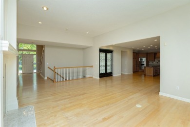 Enjoy luxury living in this stunning executive 1.5-story on Glen Oaks Country Club in Iowa - for sale on GolfHomes.com, golf home, golf lot