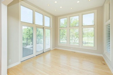 Enjoy luxury living in this stunning executive 1.5-story on Glen Oaks Country Club in Iowa - for sale on GolfHomes.com, golf home, golf lot