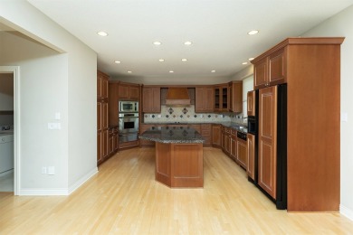 Enjoy luxury living in this stunning executive 1.5-story on Glen Oaks Country Club in Iowa - for sale on GolfHomes.com, golf home, golf lot