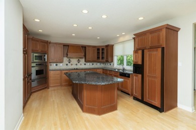 Enjoy luxury living in this stunning executive 1.5-story on Glen Oaks Country Club in Iowa - for sale on GolfHomes.com, golf home, golf lot