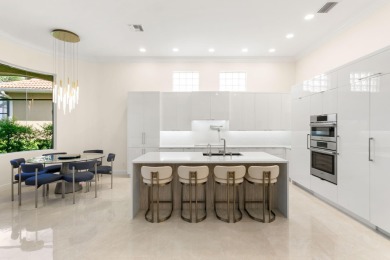 Step into your own slice of paradise in this beautifully updated on Vineyards Golf and Country Club in Florida - for sale on GolfHomes.com, golf home, golf lot
