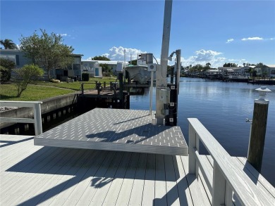 WATERFRONT living at its finest! HIGH & DRY!!! This lovely 2 on Mangrove Bay Golf Course in Florida - for sale on GolfHomes.com, golf home, golf lot