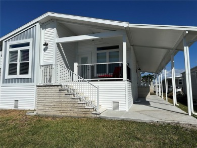 WATERFRONT living at its finest! HIGH & DRY!!! This lovely 2 on Mangrove Bay Golf Course in Florida - for sale on GolfHomes.com, golf home, golf lot