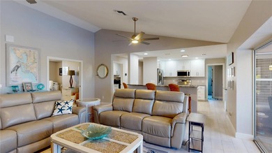 Experience the best of Florida living in this beautifully on Twin Isles Country Club in Florida - for sale on GolfHomes.com, golf home, golf lot