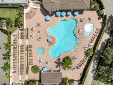 Step into your own slice of paradise in this beautifully updated on Vineyards Golf and Country Club in Florida - for sale on GolfHomes.com, golf home, golf lot