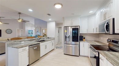 Experience the best of Florida living in this beautifully on Twin Isles Country Club in Florida - for sale on GolfHomes.com, golf home, golf lot