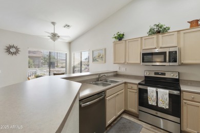 Welcome to this charming 2-bed, 2-bath home on the walking path on Sun Lakes Country Club in Arizona - for sale on GolfHomes.com, golf home, golf lot