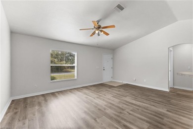 Welcome to your dream home!  As you step inside, you'll be on Bobcat Trail Golf Club in Florida - for sale on GolfHomes.com, golf home, golf lot