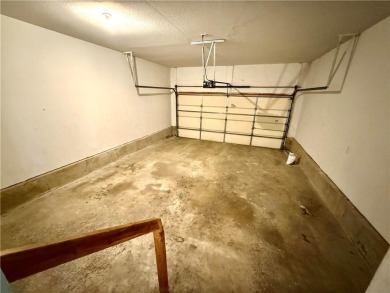 This spacious half-duplex in Golf View Villas features both on Teetering Rocks Links in Missouri - for sale on GolfHomes.com, golf home, golf lot